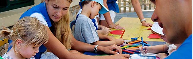 parents and kids making crafts and painting in Kalimera Kriti Hotel's Mini Club