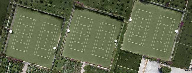 aerial view of three tennis courts in Kalimera Kriti Hotel, Sisi - Crete